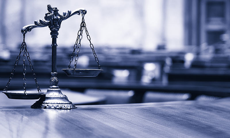 Courtroom scales of justice. Witness Evidence